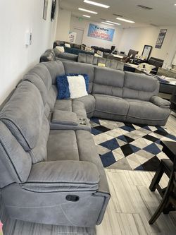 Holiday sale. Alejandra gray reclining sectional only $1799. Easy finance option. Same day delivery.