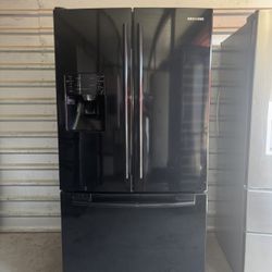 Black Samsung Refrigerator And Freezer