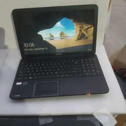 TOSHIBA LAPTOP  WITH CHARGER INCLUDED  WORKING PERFECT 