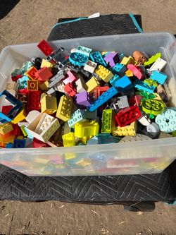 Open Boxes Of Lego Duplo With Racing Cars