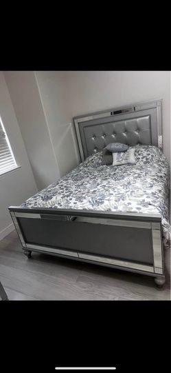 bed with dresser and cabinet 