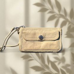 Coach Essential small wristlet in tan or beige leather 