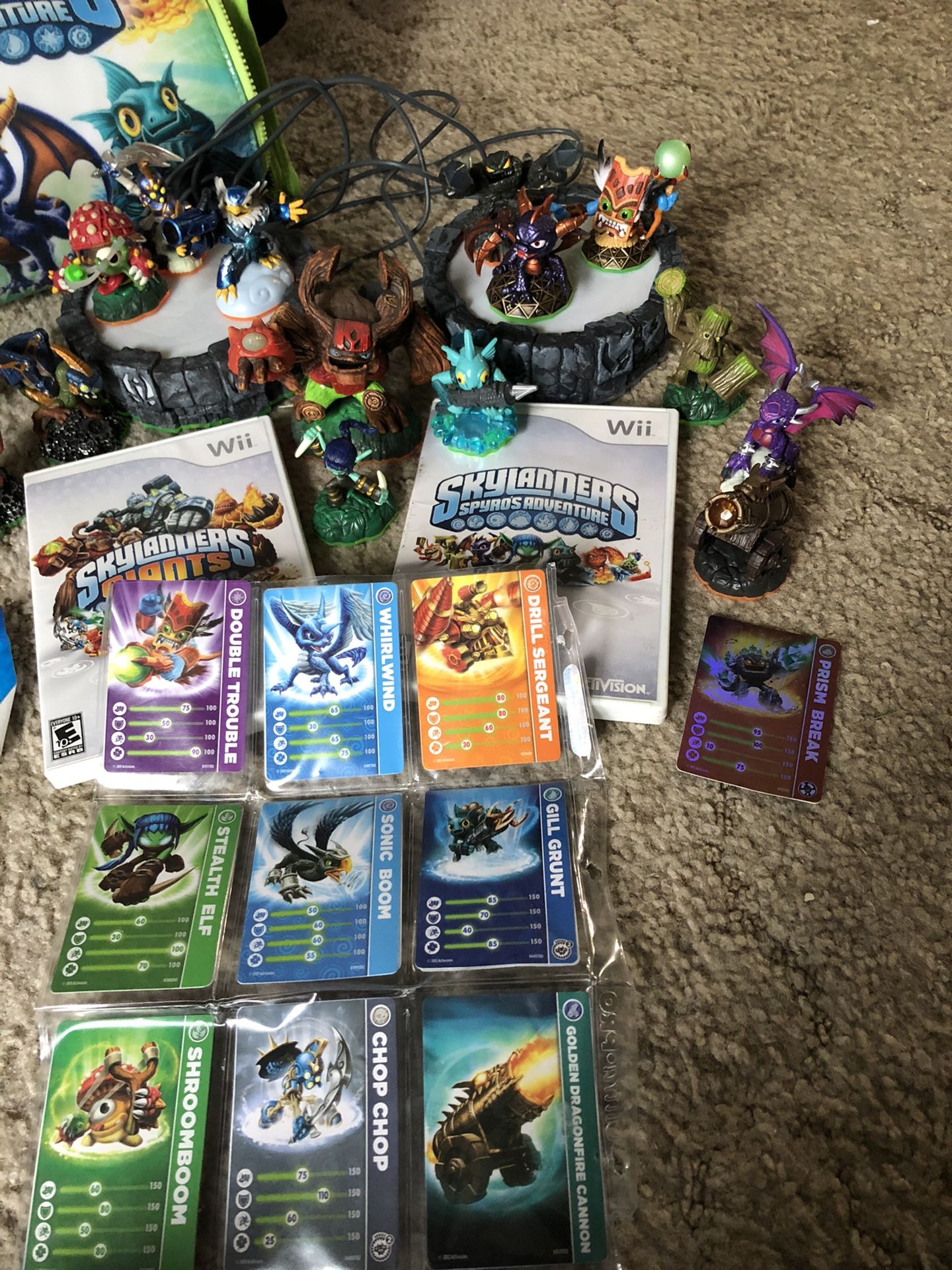 Skylander Wii games and 16 characters with carrying case