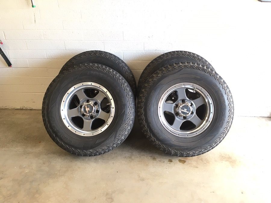 Level 8 Punch wheels and 265/75r16 Pathfinder All Terrain