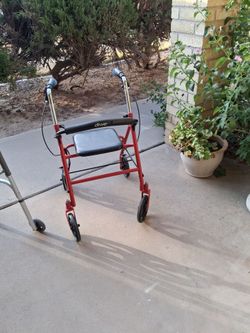 Rolling walker red