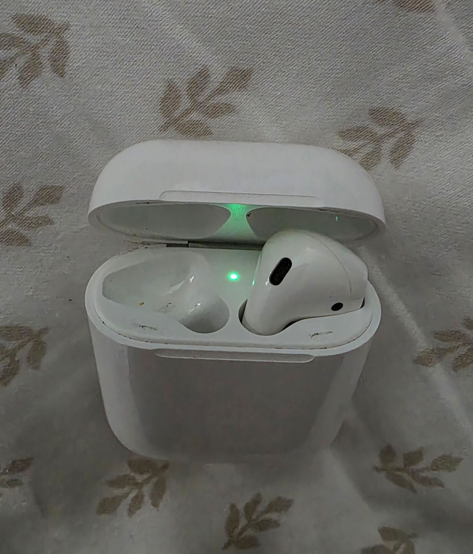 Apple AirPods Earbuds with Charging Case.