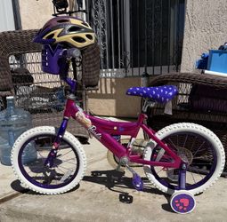 Like new barbie bike and helmet