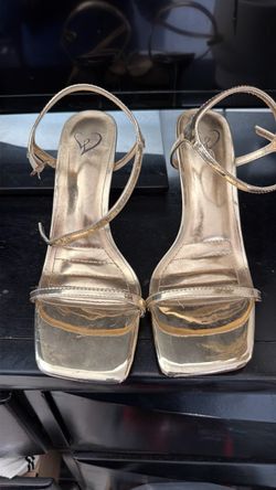 Gold high heels