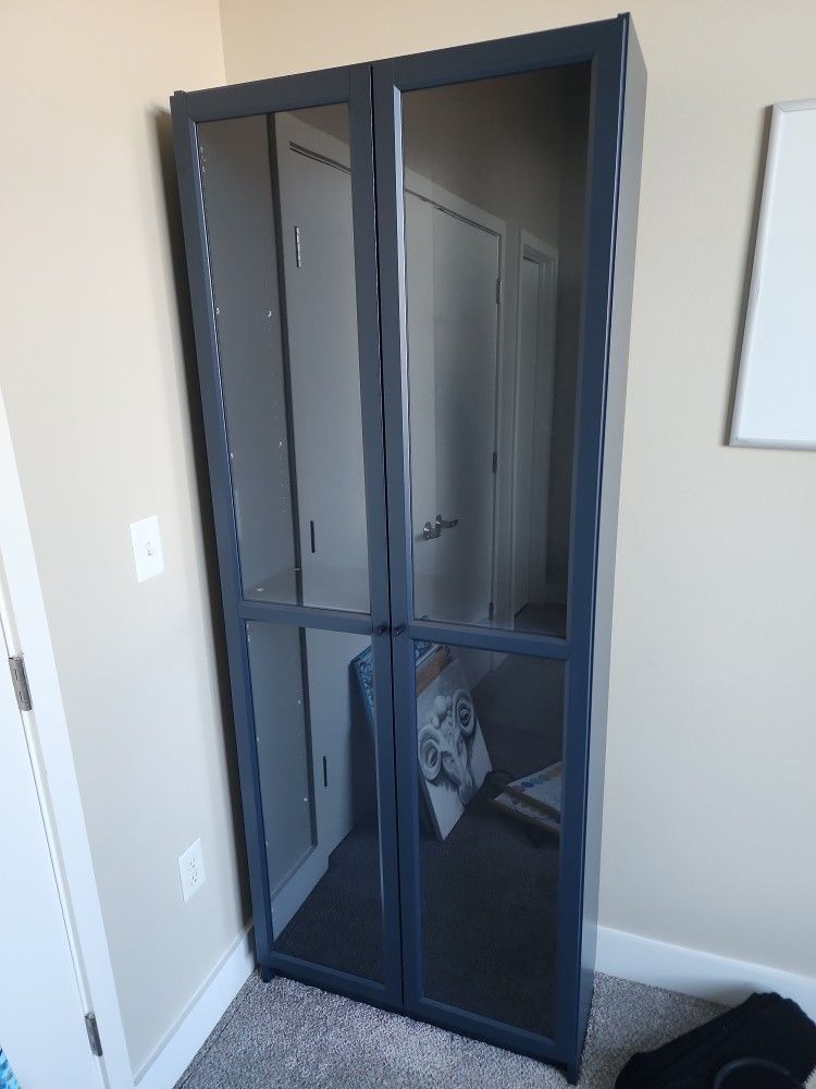 Pair Of Navy Blue Bookshelves With Glass