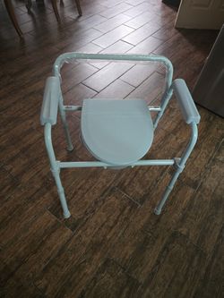 Folding Steel Bedside Commode Chair -
