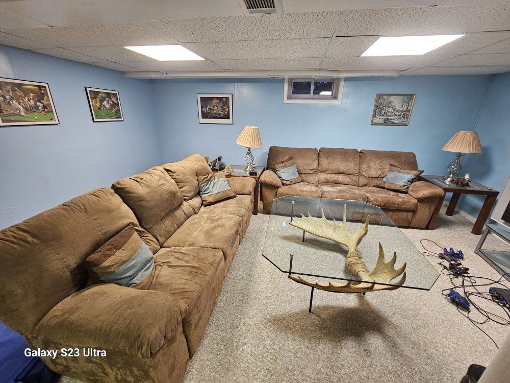 2 Three Person Couches. Each Couch Has 2 Recliners