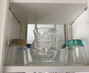 cut crystal glass pitcher with matching colorful tumblers 