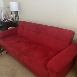 RED FUTON COUCH