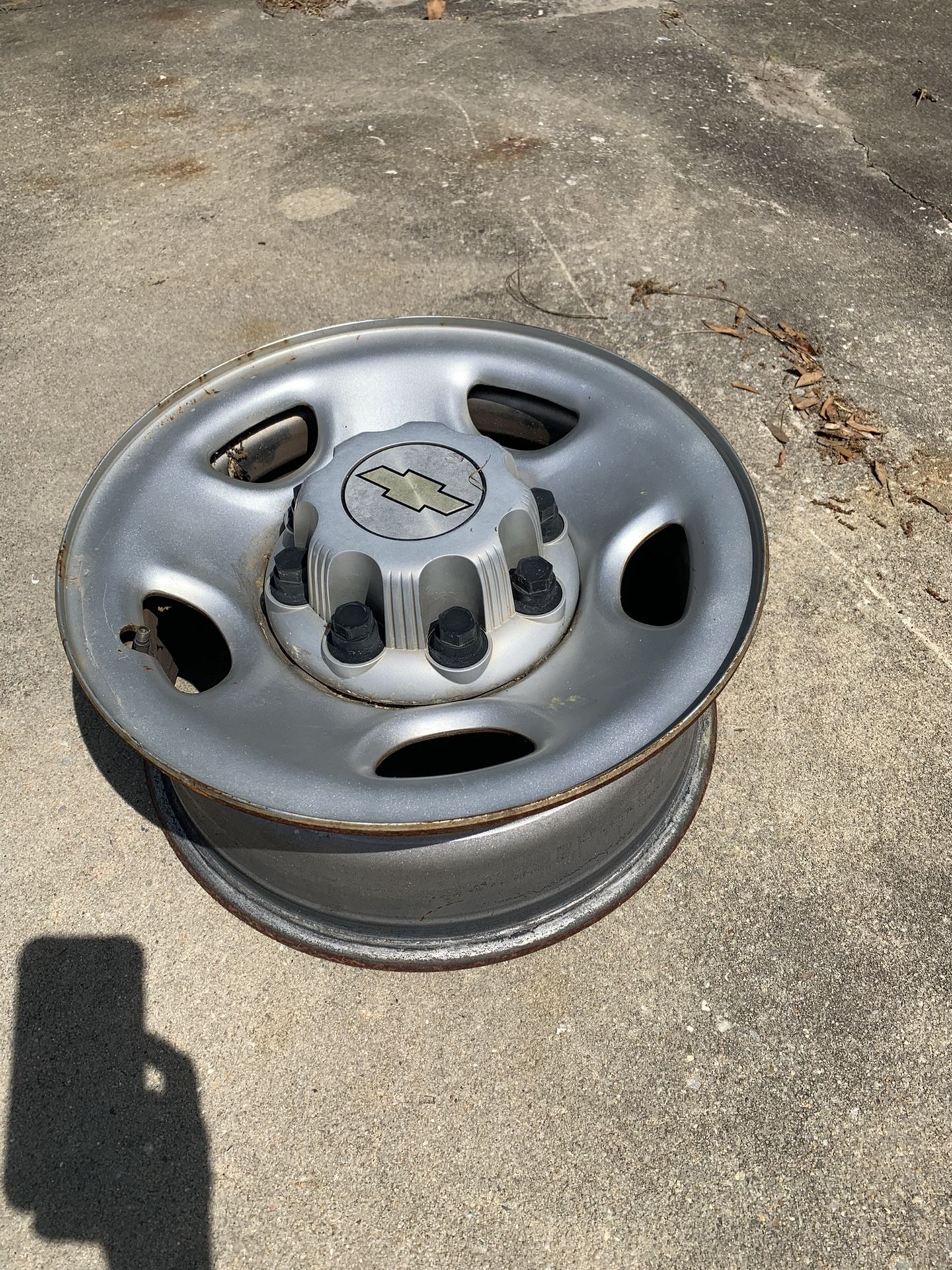 4 Chevy 8 lug steel wheel with all center caps