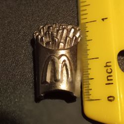  This is a 2006 McDonald's Monopoly French Fries token