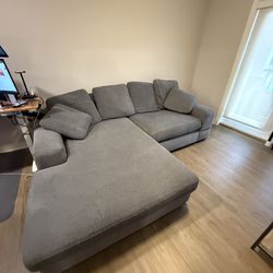 Grey Reversible Sectional With Ottoman 