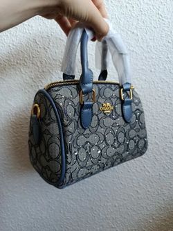 Coach bag with straps