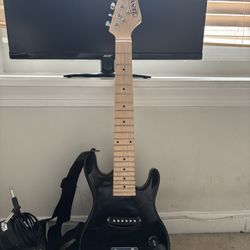 mini Electric Guitar with amp looking To Sell 