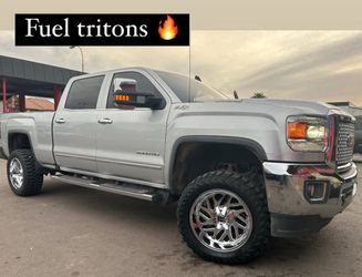 GMC sierra wheels an tires 20x10 with 33