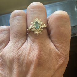 14k solid yellow gold marquis shaped emerald and diamond cluster ring