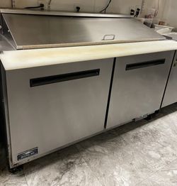 2 commercial restaurant refrigerated prep tables sold separately of together