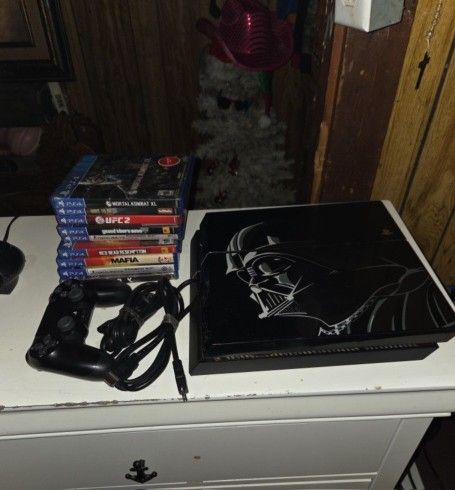 PS4 500GB Star Wars Darth Vader Edition console with controller and 9 games