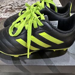 Adidas kids soccer cleats and chin guards