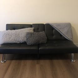 Black Leather Tufted Futon