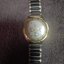 Fossil Blue Men's Quartz Analog With A Gold Tone Case And A 2 Toned gold And Silver Metal Band For Sale.
