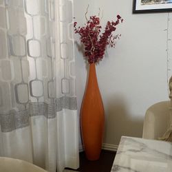 Big orange vase WITH flowers