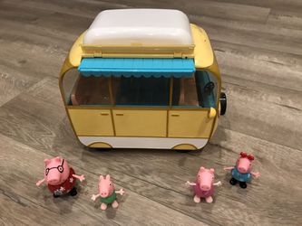 Peppa Pig’s Camper Van with Retractable Awning and removable seats. Pigs not included with sale of camper van.