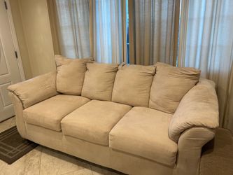 Ivory color microfiber fabric sofa.