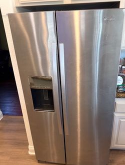 Whirlpool side by side Refrigerator