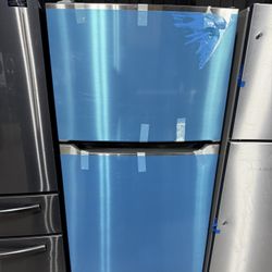 Brand new Frigidaire 30 in. 20 cu. ft. Garage Ready Freestanding Top Freezer Refrigerator in Stainless Steel, ENERGY STAR