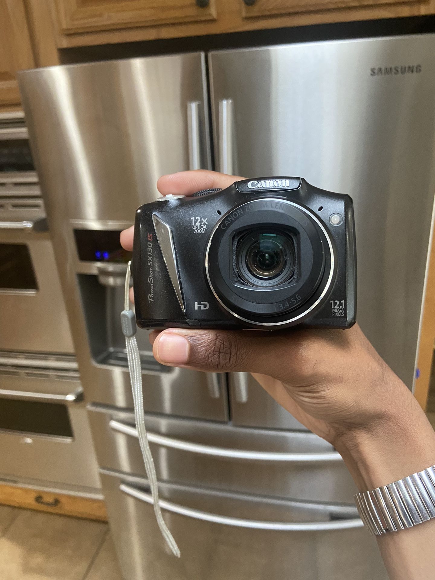 Canon Powershot SX130 IS digital camera with 12MP, 12x zoom lens