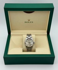 1985 Rolex OysterDate 34mm stainless steel oyster bracelet smooth bezel silver dial 6694 watch box tag appraisal