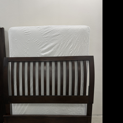 Queen-size bed with mattress