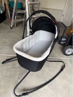 Like New Baby Bassinet with Rocking Stand
