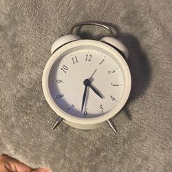 White little vintage alarm clock 