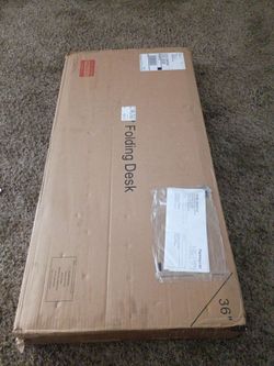 Folding desk in box 10 $