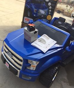 Blue ford raptor power wheels sales