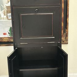 Absolutely gorgeous black,  space saving secretary desk with top drawer, drop-down desk with two shelve storage cabinet.   52” inches tall 12” inches 