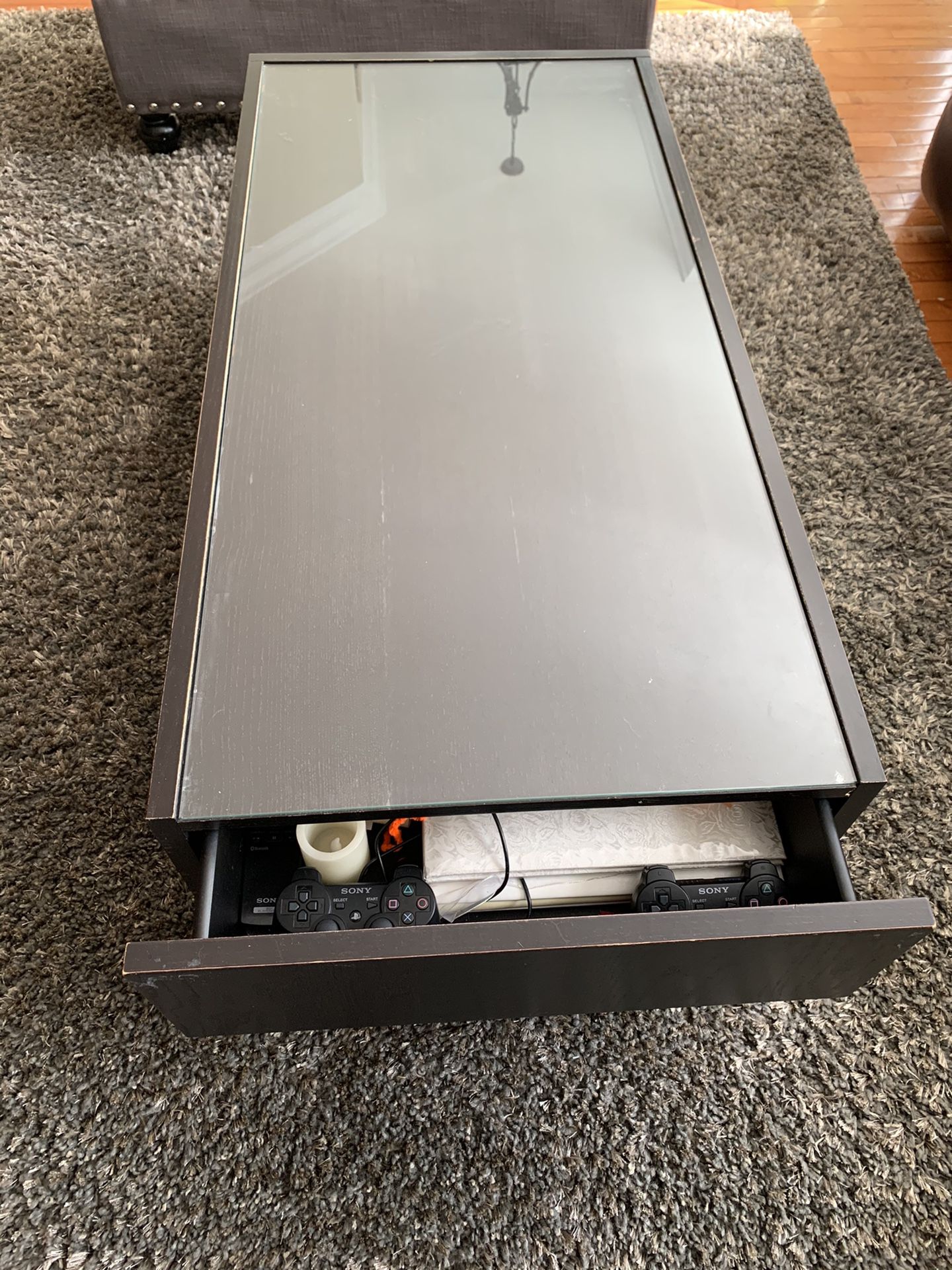 Coffee table with storage drawers