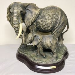 Elephant & Baby Statuette On Wooden Base