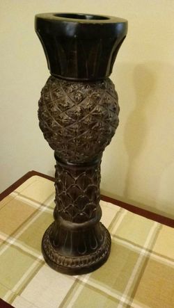 Tall pillar candle holder.