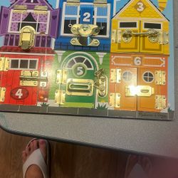 Melissa and Doug latches board