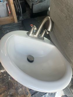Bathroom sink with faucet