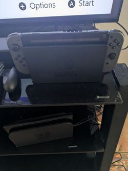 Nintendo Switch with a couple games