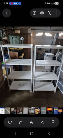 Two 4 tier shelves like new