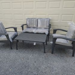 Outdoor patio 4 piece conversation set, wicker loveseat with chairs and coffee table 